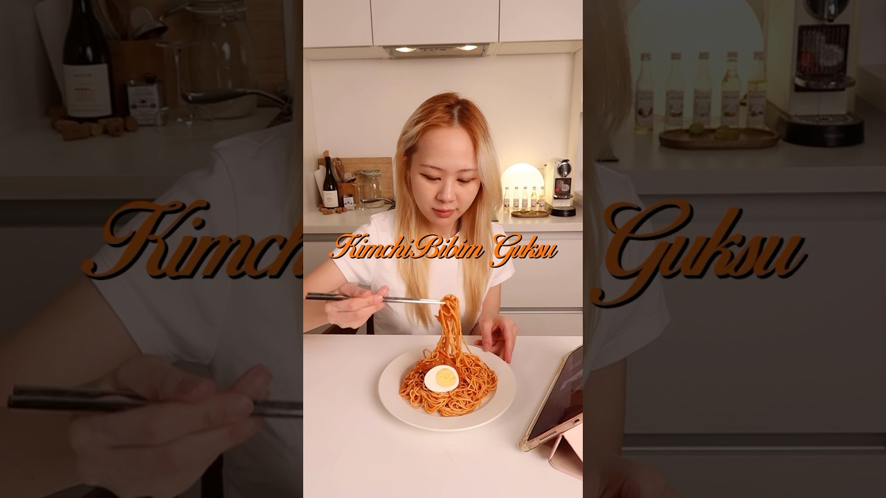 My mom's Kimchi bibim guksu. Korean Spicy Cold Noodles Recipe