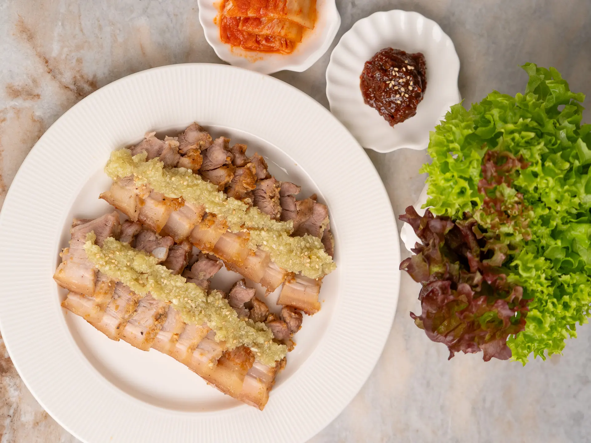 Garlic Bossam (Korean Pork Wraps): Boiled Pork Belly with Sweet Garlic Sauce garlic bossam