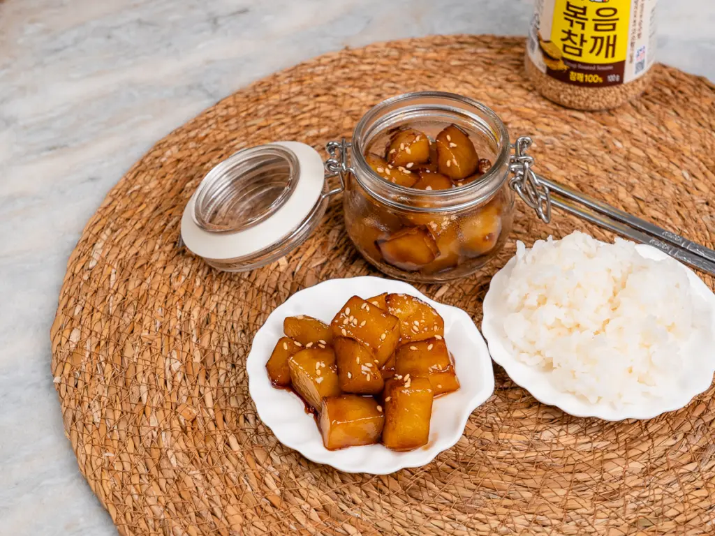 Cooking Korean braised potatoes Gamja Jorim in soy sauce