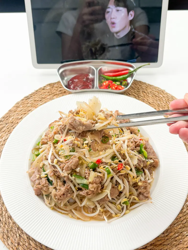 Easy Korean stir fry with thin sliced beef brisket bean sprouts and garlic
