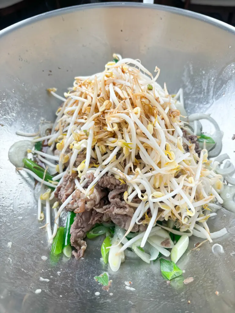 Step by step Korean beef brisket recipe in a stainless steel pan