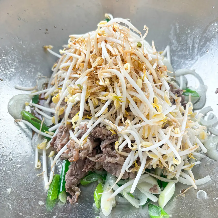 Step by step Korean beef brisket recipe in a stainless steel pan