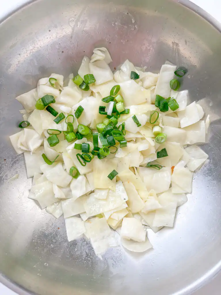 Add water to the pan so your Korean cabbage stir fry cooks evenly without burning.