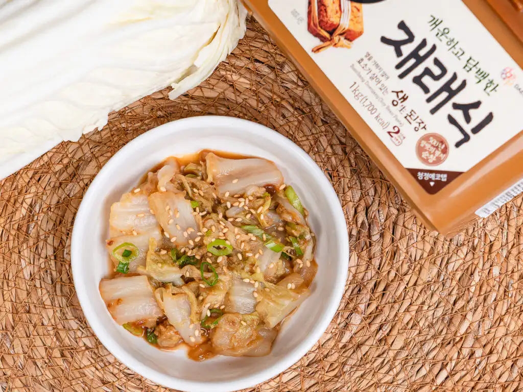 Best Korean Cabbage Side Dish Recipe – Doenjang Baechu Namul easy korean cabbage banchan, side dish baechu namul finished dish with doenjang sauce sesame oil and green onion