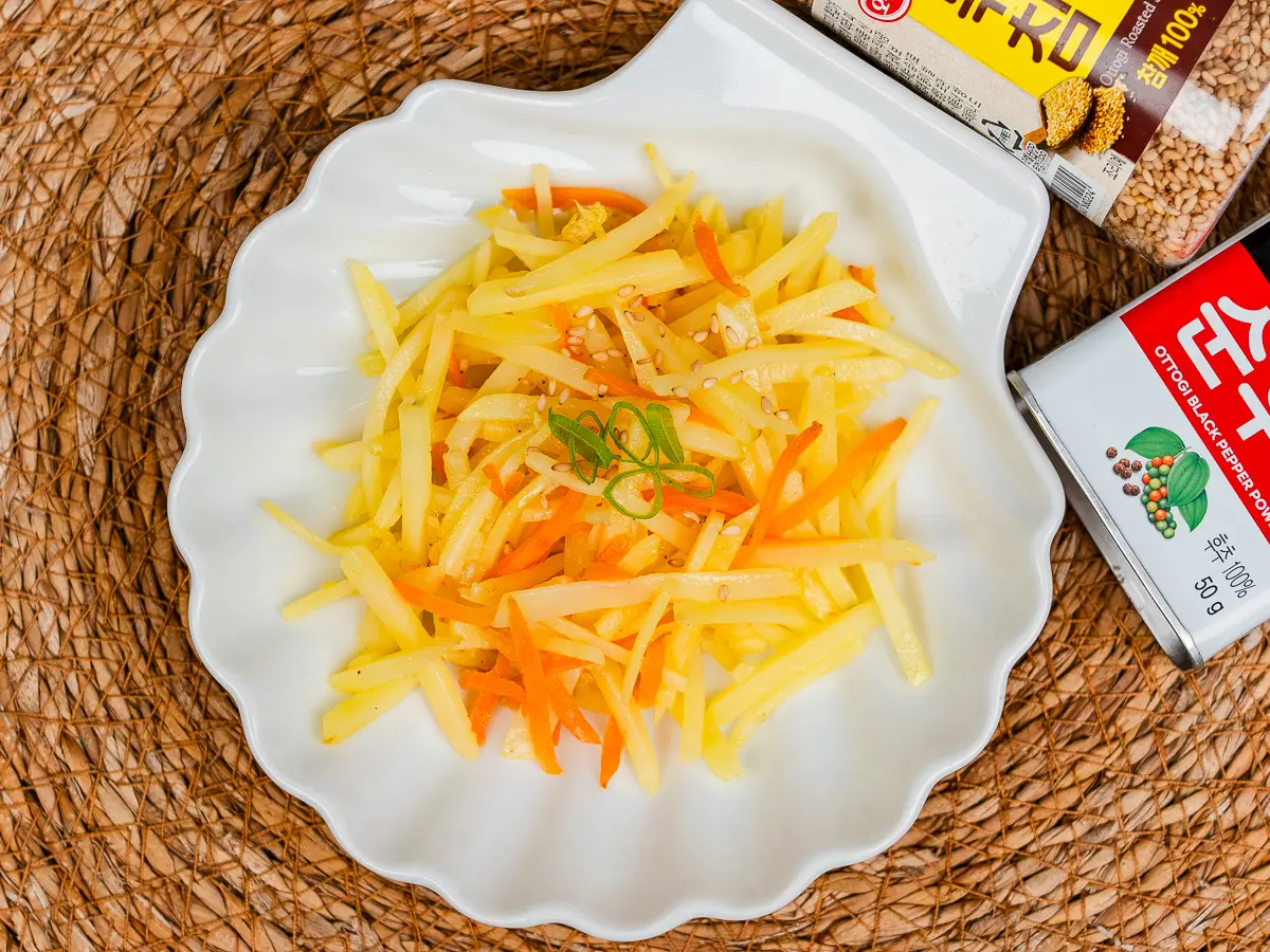 Banchan potato gamja bokkeum bright and colorful with orange carrot and green onion