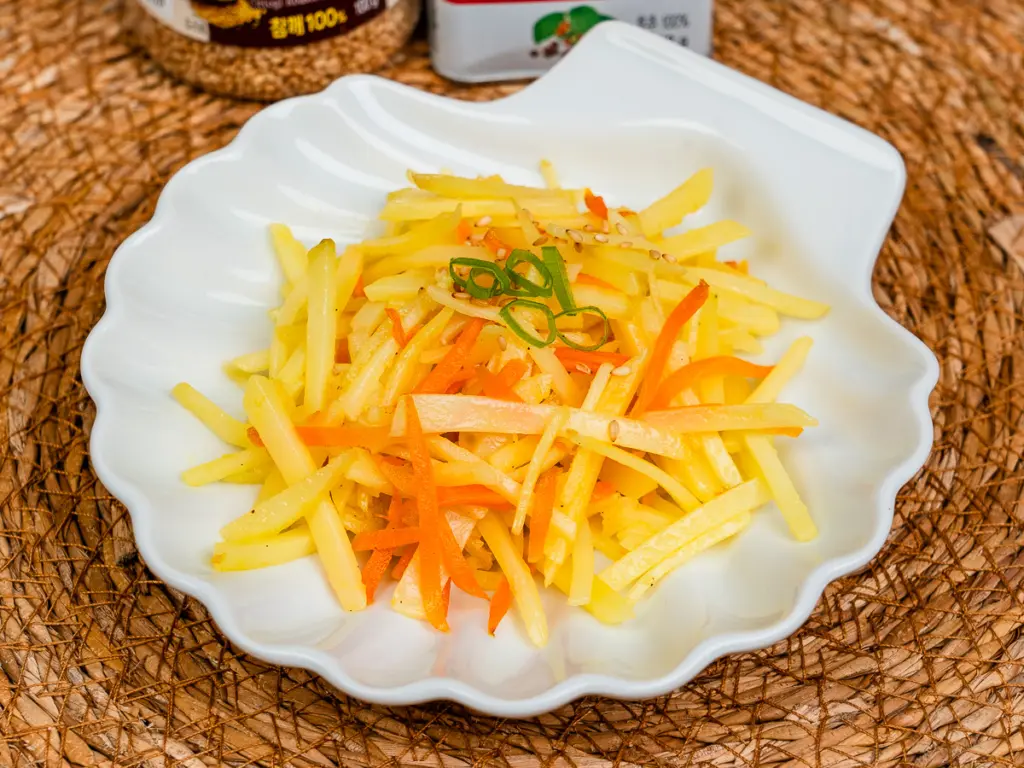 Easy Korean potato side dish gamja bokkeum in meal prep containers for the week