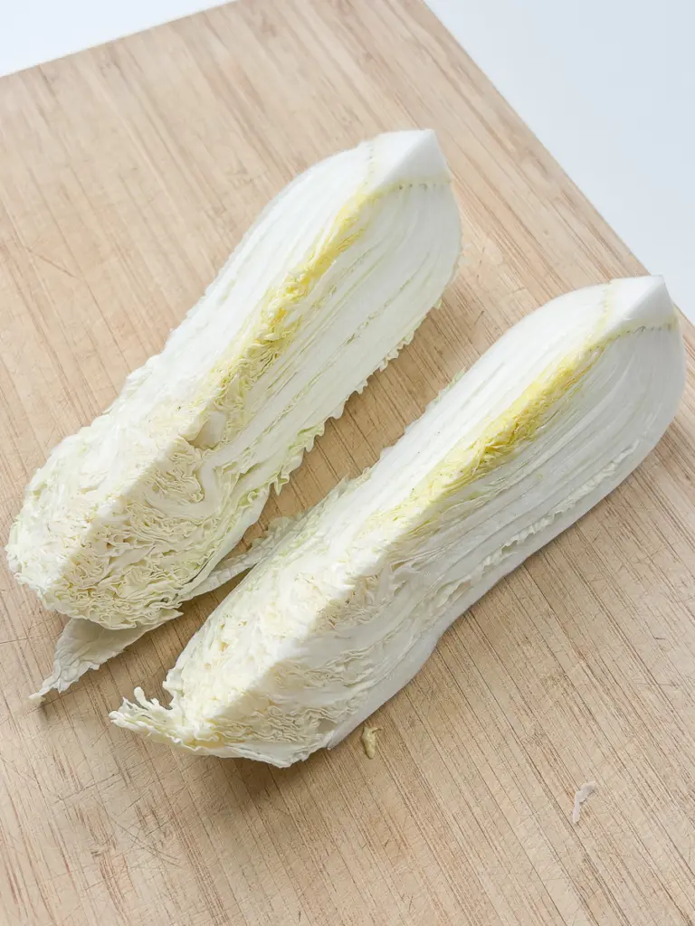 cutting napa cabbage into wedges for pan fried cabbage steaks