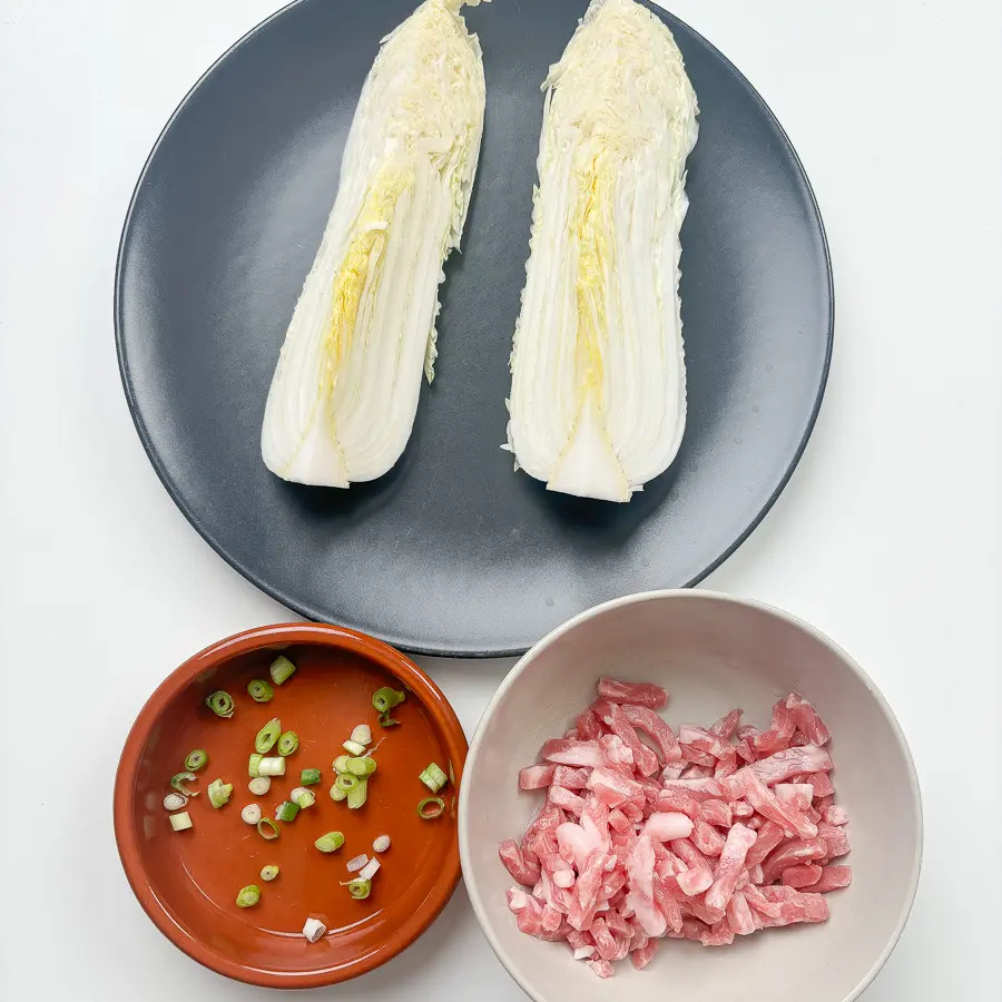 ingredients for pan fried cabbage steaks with cheese bacon and parmesan