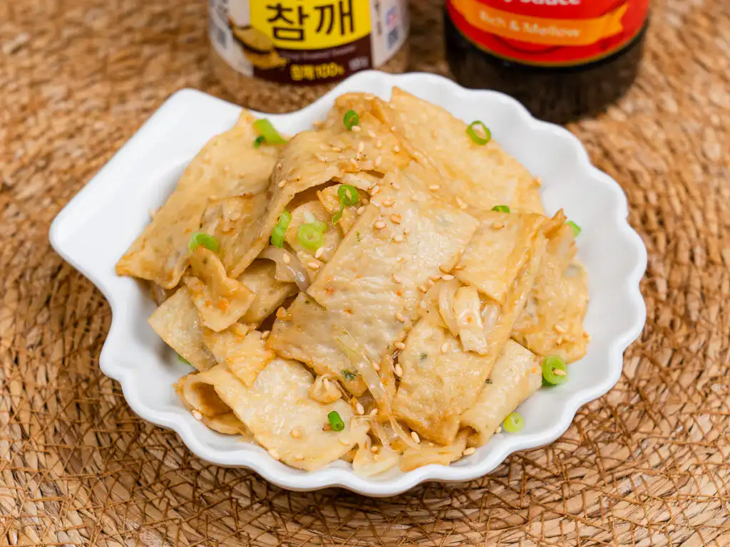 Overhead shot of eomuk bokkeum in a shallow ceramic dish