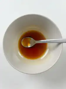 Eomuk bokkeum sauce being whisked together before cooking