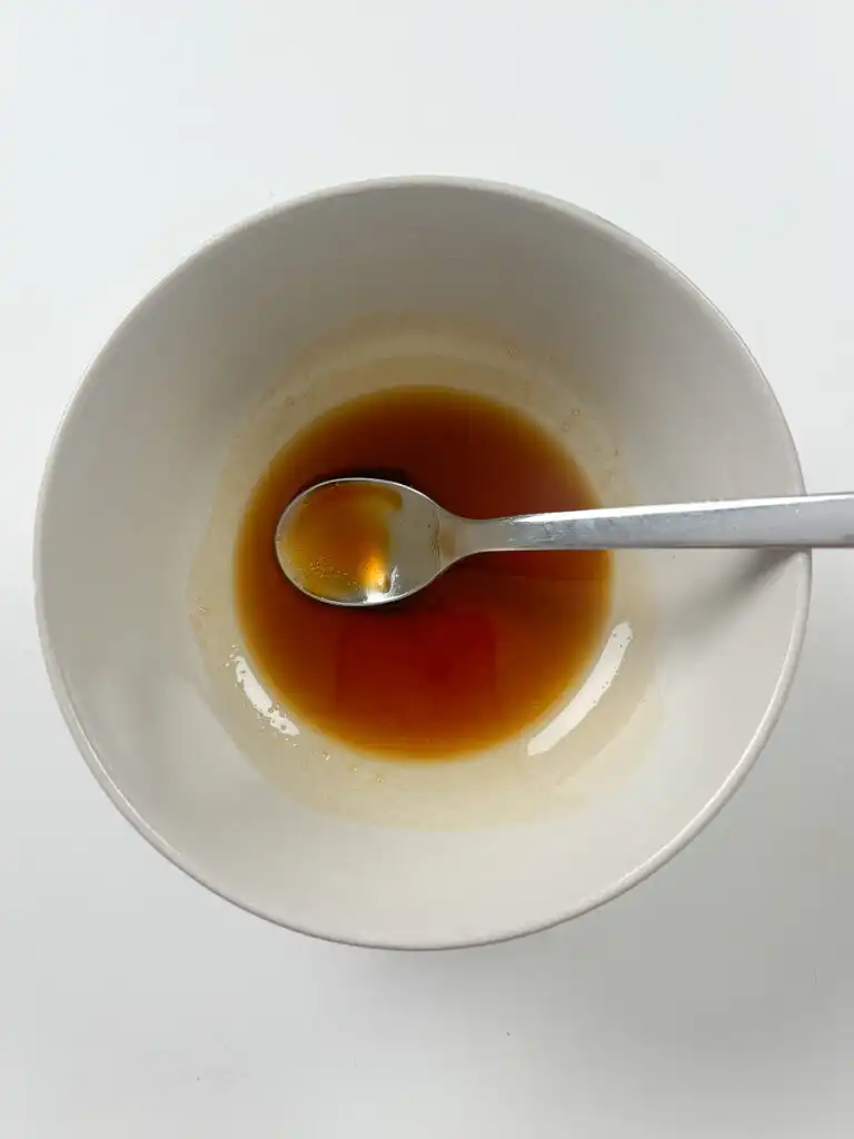 Eomuk bokkeum sauce being whisked together before cooking