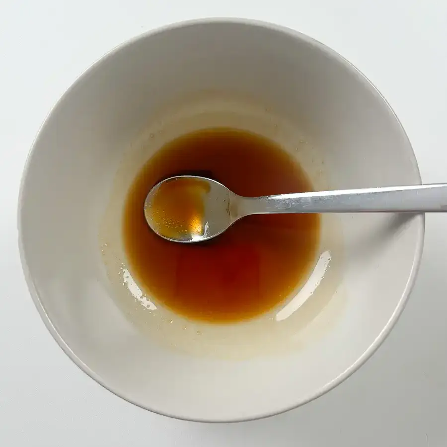 Eomuk bokkeum sauce being whisked together before cooking