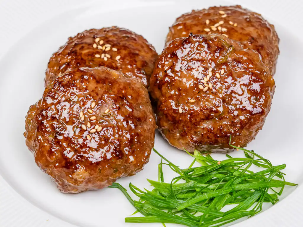 Authentic tteokgalbi Korean beef patties with glossy sweet soy glaze