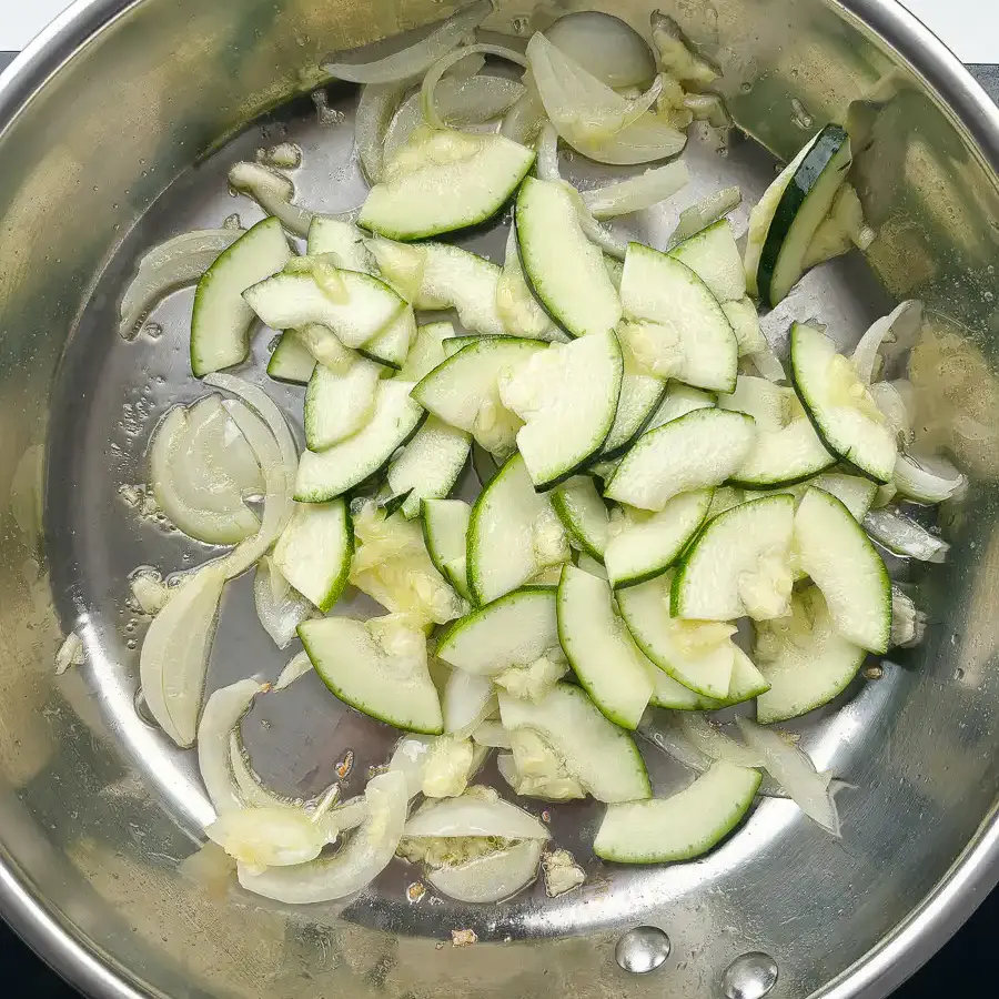 Grandma's Zucchini Stir Fry: 15-Min Best Korean Side Dish cooking oil being added to pan for recipe for stir fried zucchini