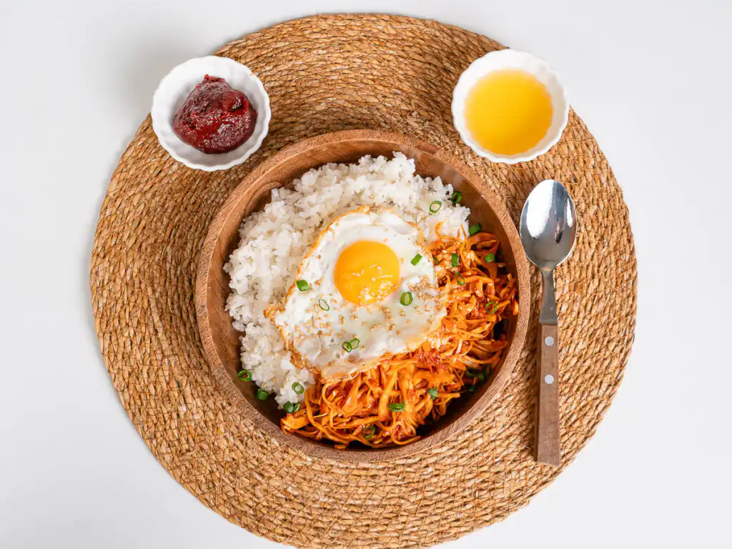Spicy Korean cabbage rice bowl with sesame seeds