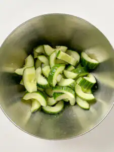Cubed cucumber kimchi - 30Min Quick Kimchi Recipe Cubed cucumber tossed with coarse sea salt and sugar in a mixing bowl