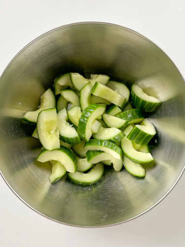 Cubed cucumber kimchi - 30Min Quick Kimchi Recipe Cubed cucumber tossed with coarse sea salt and sugar in a mixing bowl