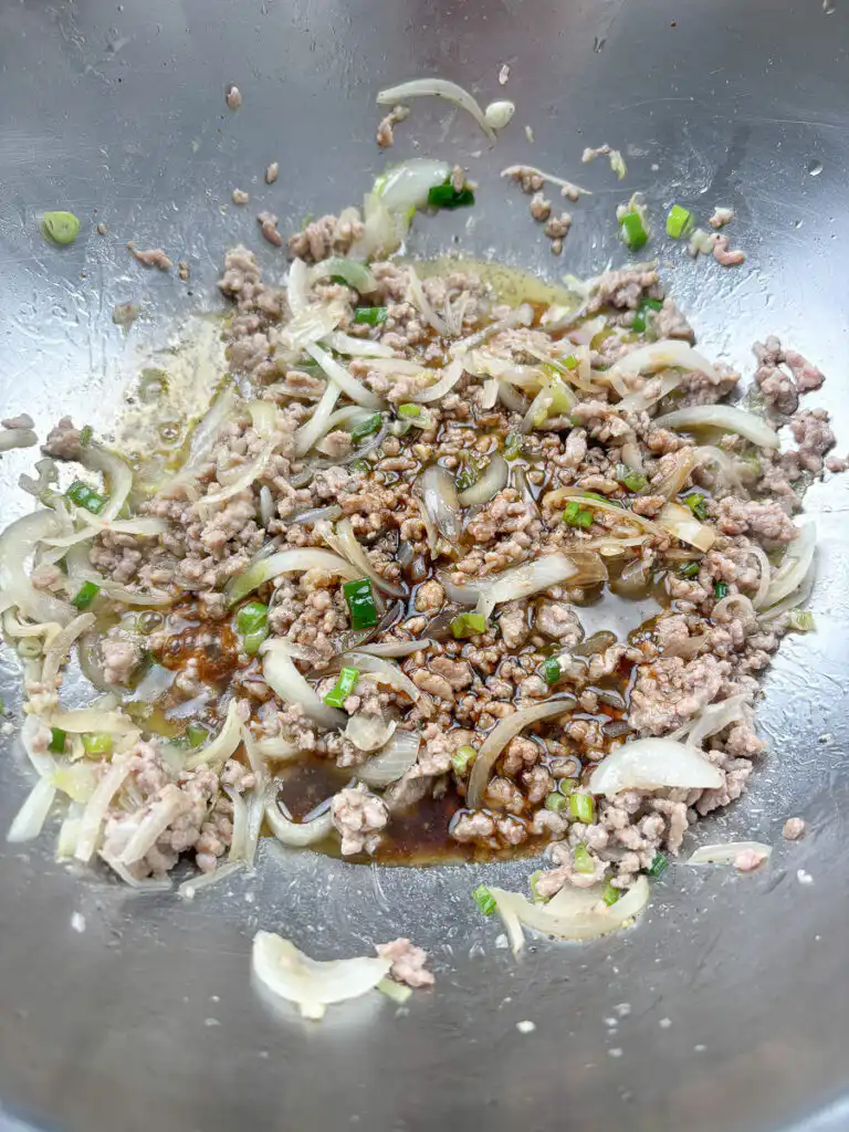 Oyster sauce soy sauce mirin and sugar mixed in a bowl for eggplant oyster sauce recipe