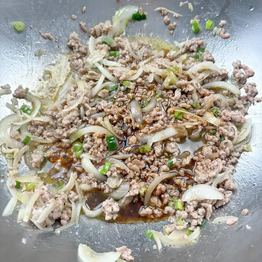 Oyster sauce soy sauce mirin and sugar mixed in a bowl for eggplant oyster sauce recipe