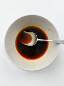 Oyster sauce soy sauce mirin and sugar mixed in a bowl for eggplant oyster sauce recipe