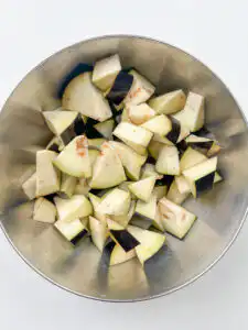 Large eggplant cut into chunky pieces for Korean eggplant rice bowl