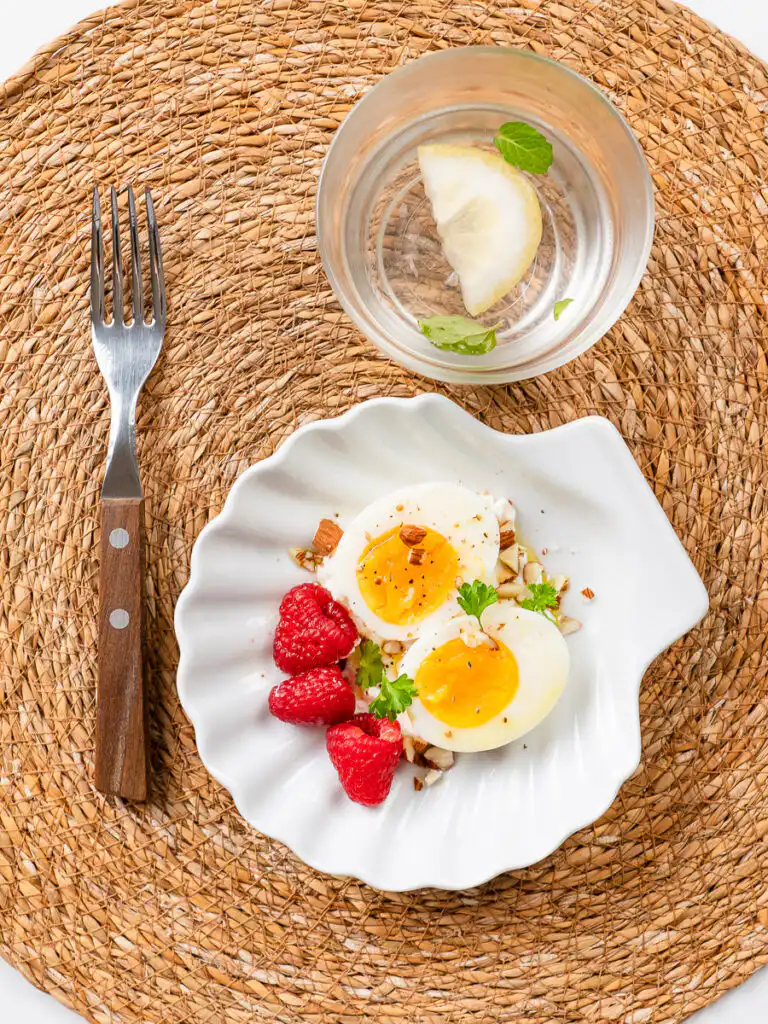Natural Wegovy Healthy Egg Breakfast: GLP-1 Food natural wegovy egg breakfast plate soft-boiled egg ricotta almonds raspberries olive oil