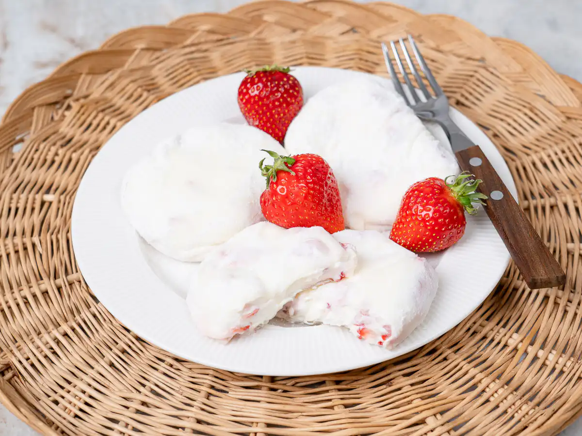 rice paper mochi with strawberry and greek yogurt on white plate
