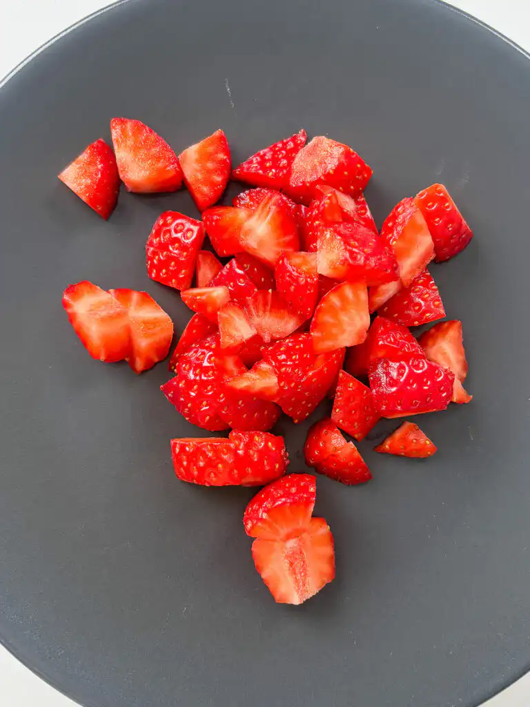 cut the strawberries for rice paper mochi