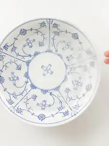 soaking rice paper in warm water for mochi