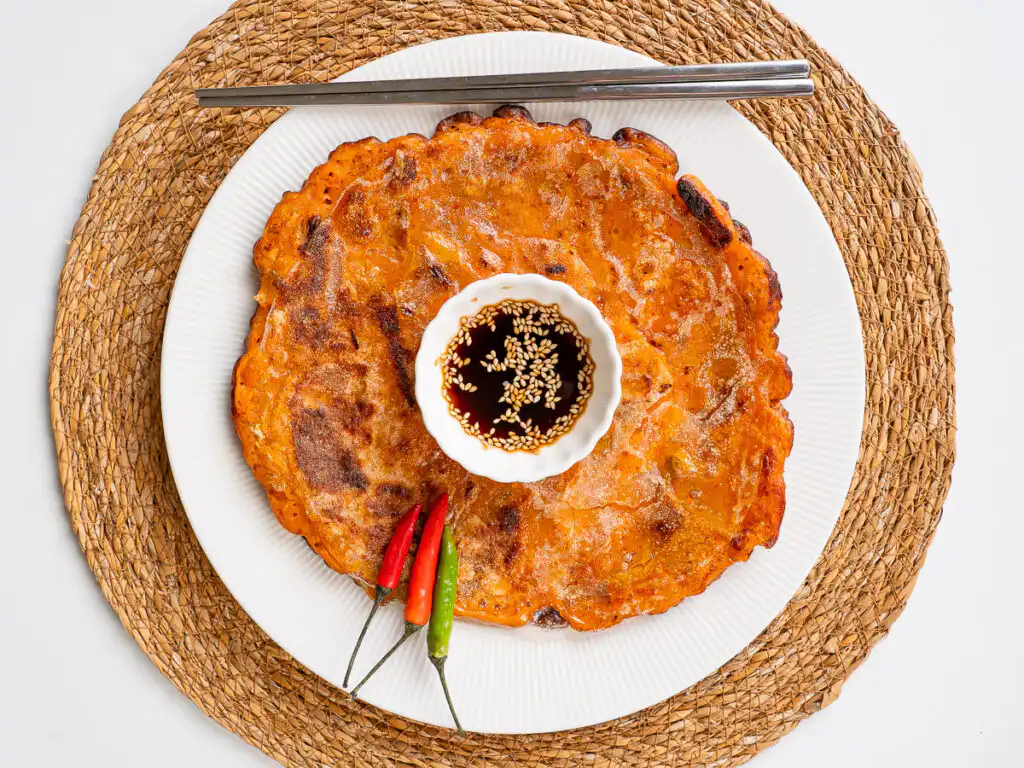 Rice Paper Kimchi Pancake - Crispier Kimchi Jeon Korean Hack Crispy kimchi pancake close-up showing shatteringly crunchy rice paper crust