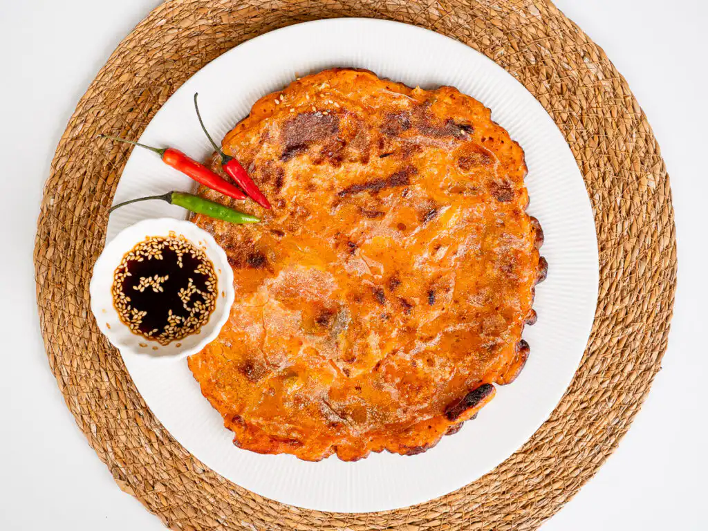 Crispy kimchi pancake with a sweet-tangy buchimgae soy dipping sauce