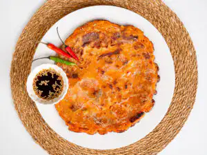 Rice Paper Kimchi Pancake - Crispier Kimchi Jeon Korean Hack Crispy kimchi pancake with a sweet-tangy buchimgae soy dipping sauce