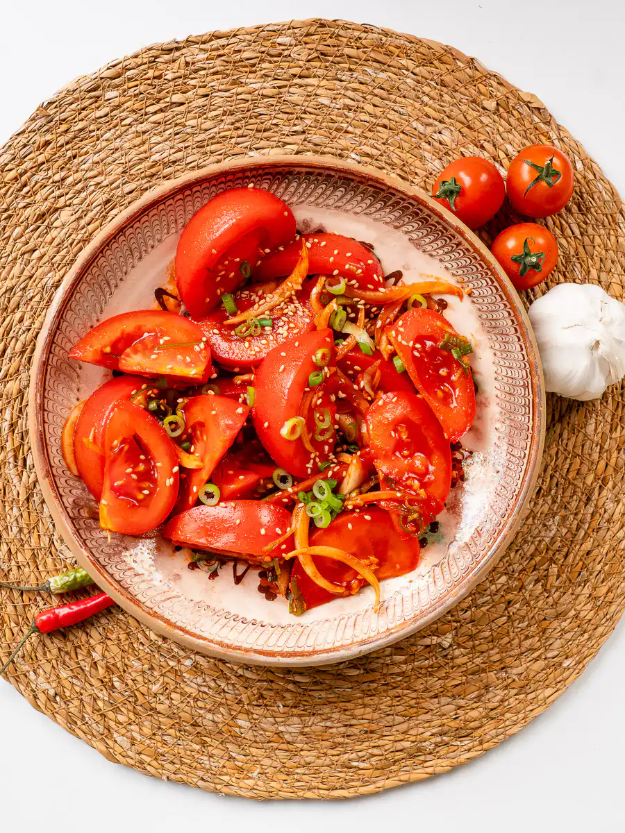 quick kimchi recipe tomato with sesame seeds top-down flat lay