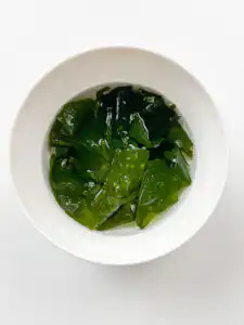 Korean Cucumber Soup (Oi Naengguk) - Best Cold Summer Soup Dried seaweed soaking in cold water for Korean cucumber soup