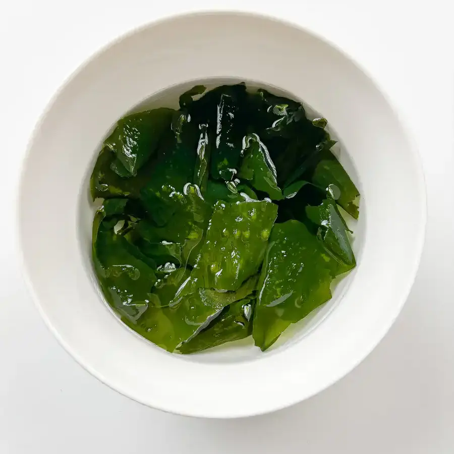 Korean Cucumber Soup (Oi Naengguk) - Best Cold Summer Soup Dried seaweed soaking in cold water for Korean cucumber soup