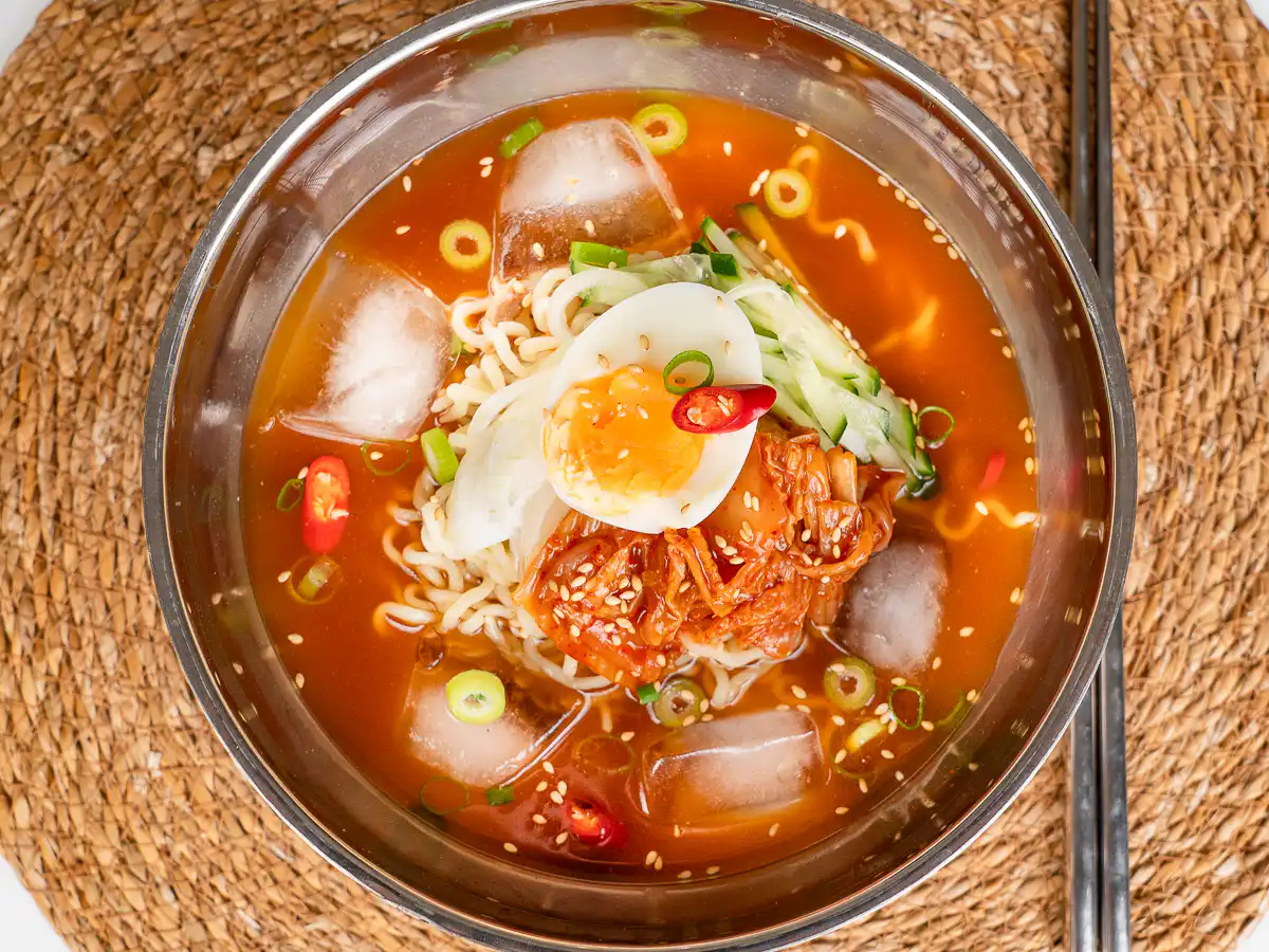 Kimchi cold noodle recipe served in a traditional Korean bowl