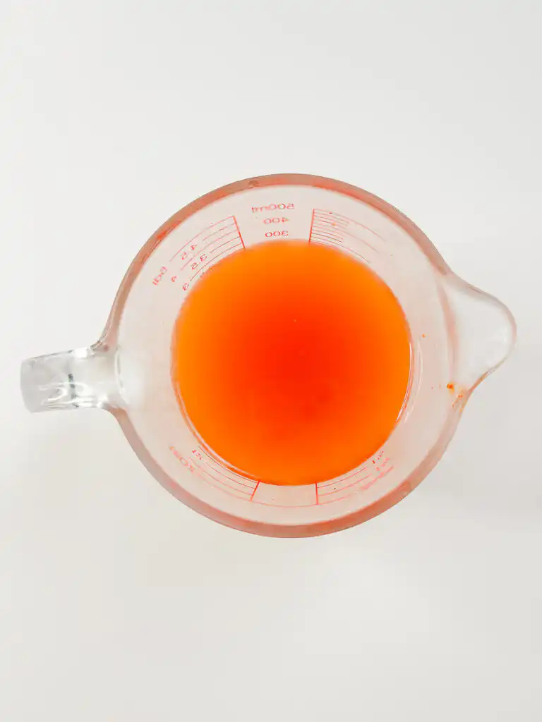 Kimchi juice and broth ingredients mixed together for kimchi mari guksu