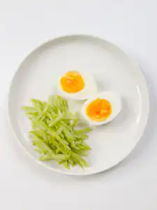 Grandma's Kimchi Korean Cold Noodles - Kimchi Mari Guksu a boiled egg and cucumber for toppings for the Korean cold noodles with kimchi