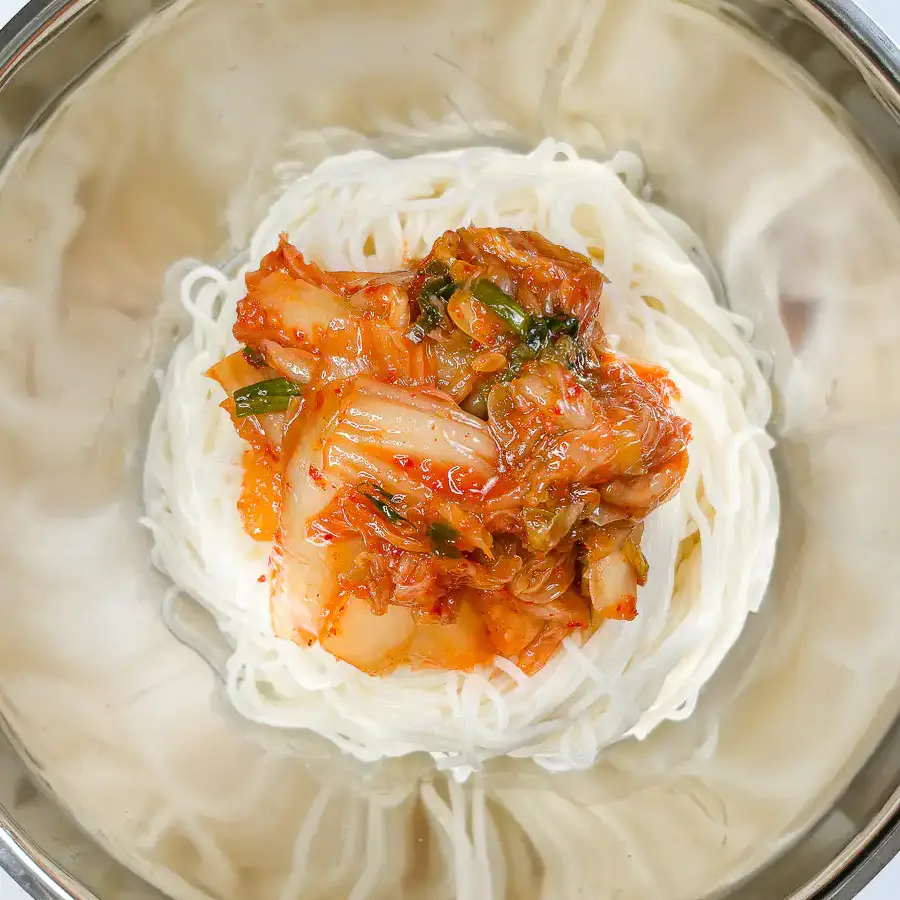 Grandma's Kimchi Korean Cold Noodles - Kimchi Mari Guksu Seasoned kimchi on the somyeon for cold kimchi noodle soup