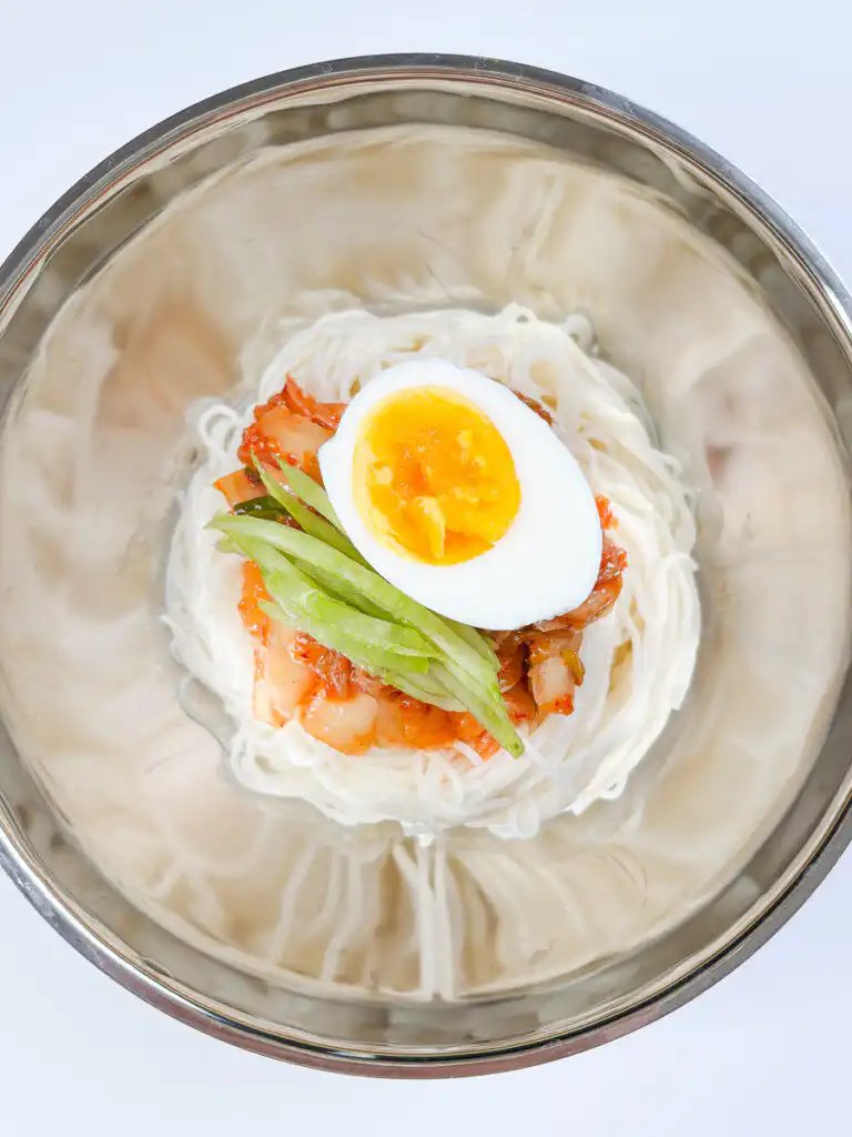 All the toppings on the noodles for the kimchi mari guksu
