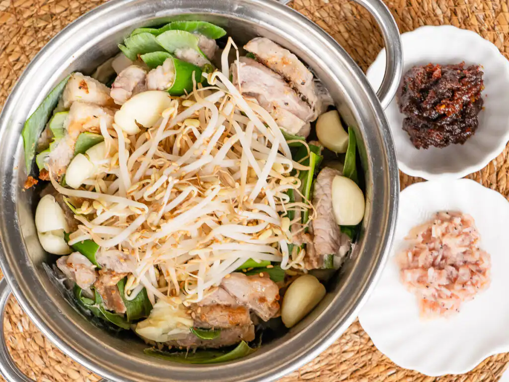 Spring Onion Bossam (Suyuk) – Juicy Waterless Pork Belly korean pork belly with green onion served family style in pot