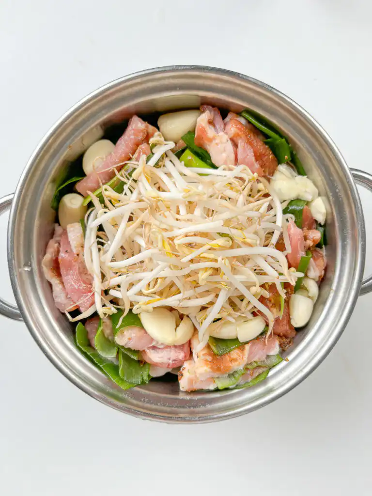 Spring Onion Bossam (Suyuk) – Juicy Waterless Pork Belly Garlic removes the gaminess of spring onion bossam.
