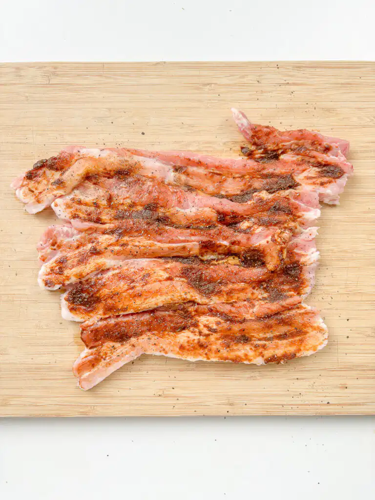 Spring Onion Bossam (Suyuk) – Juicy Waterless Pork Belly Doenjang is spread over the pork belly, the key step in this spring onion bossam recipe.