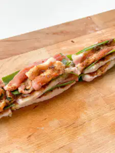 Spring Onion Bossam (Suyuk) – Juicy Waterless Pork Belly korean pork belly with green onion layered stack close up