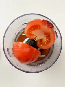 Tomato Gochujang Bibim Guksu - Summer Spicy Cold Noodles fresh tomato garlic gochujang and seasonings in a blender before blending