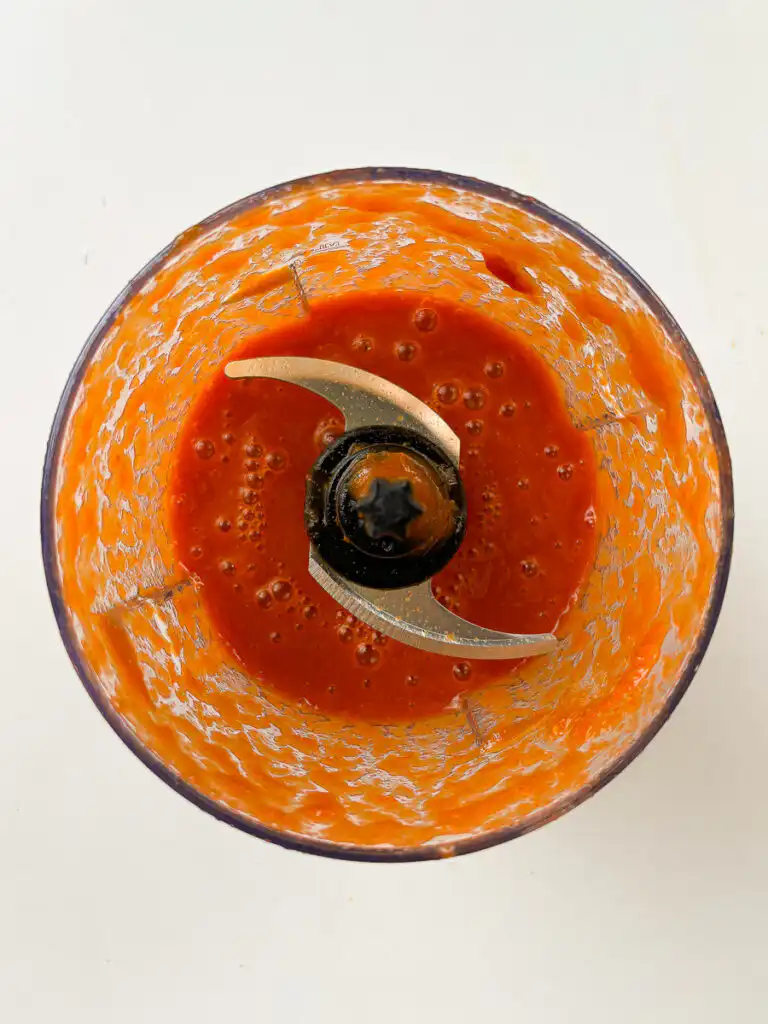 Tomato Gochujang Bibim Guksu - Summer Spicy Cold Noodles smooth blended tomato gochujang sauce in a blender