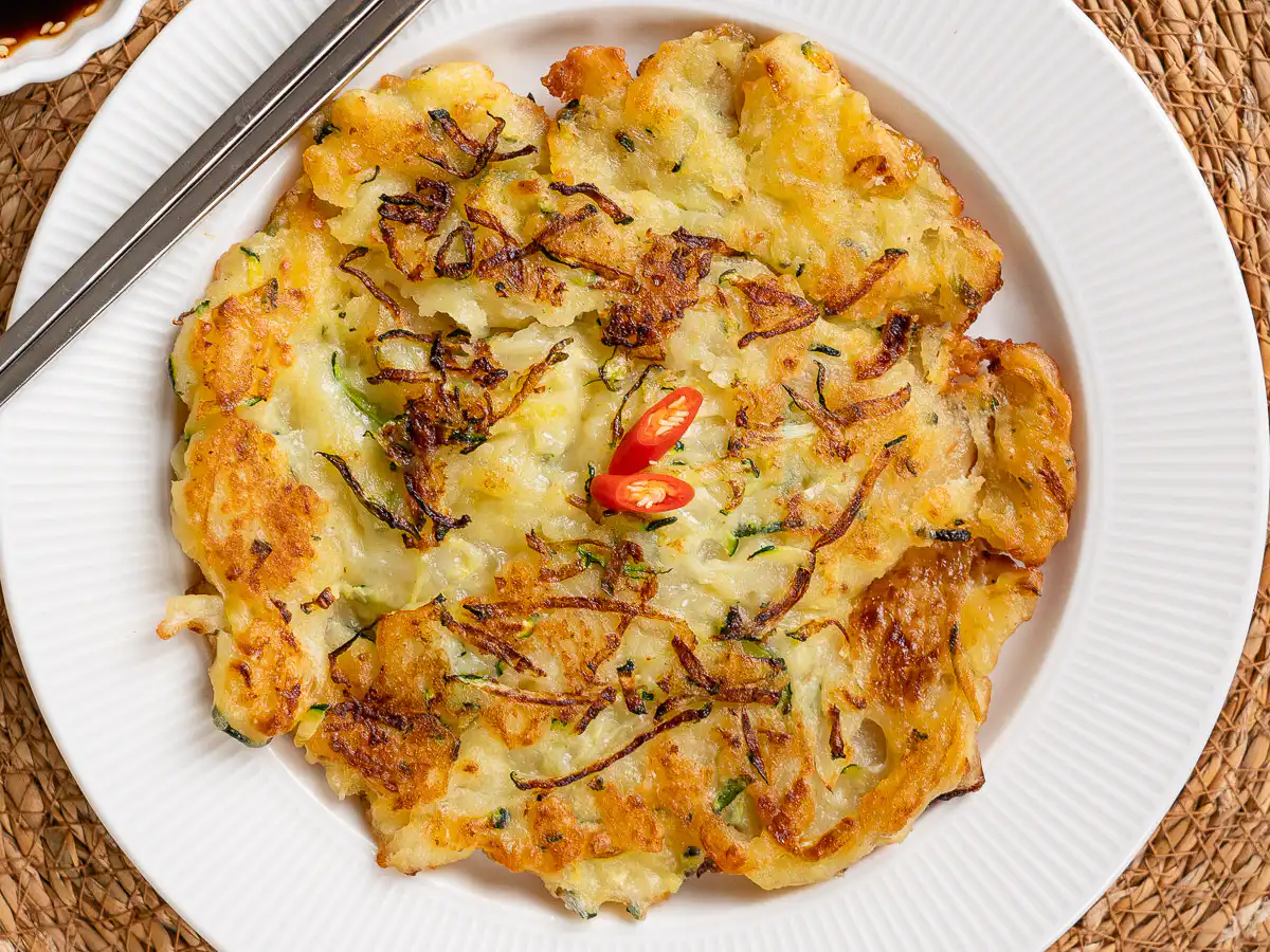 Close-up of zucchini korean pancake showing crispy edge