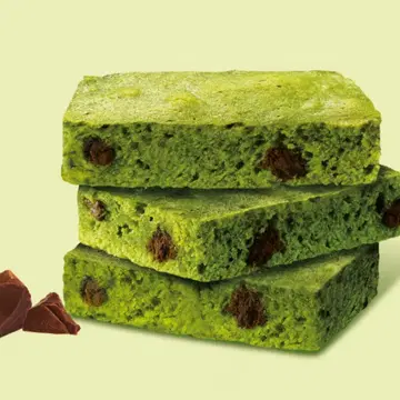 Market O Brownie matcha unwrapped showing dense fudgy brownie texture