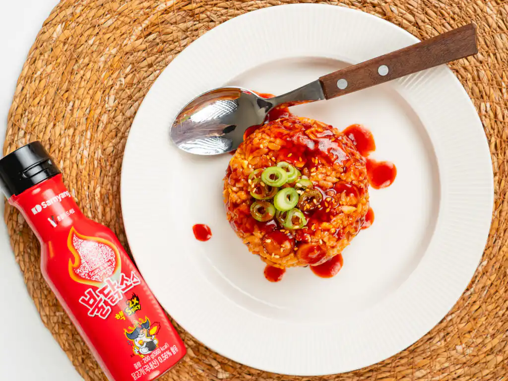 Buldak Fried Rice: Stress Blowing Buldak Sauce Rice in 10min Buldak sauce bottle beside finished dish