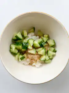 Warm cooked short-grain white rice placed in a bowl.